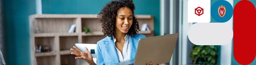 A woman is having a conversation over a computer screen