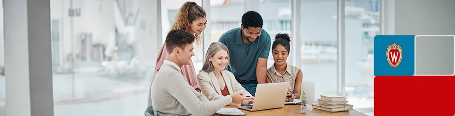 5 People are looking at a computer screen - learning what is cyber security 