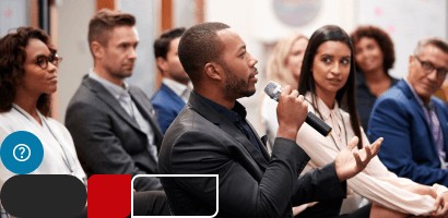 A compTIA security+ expert is talking in front of a crowd