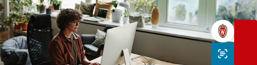 Reading and writing on her mac for preparation for the CompTIA Cysa+ certification exam